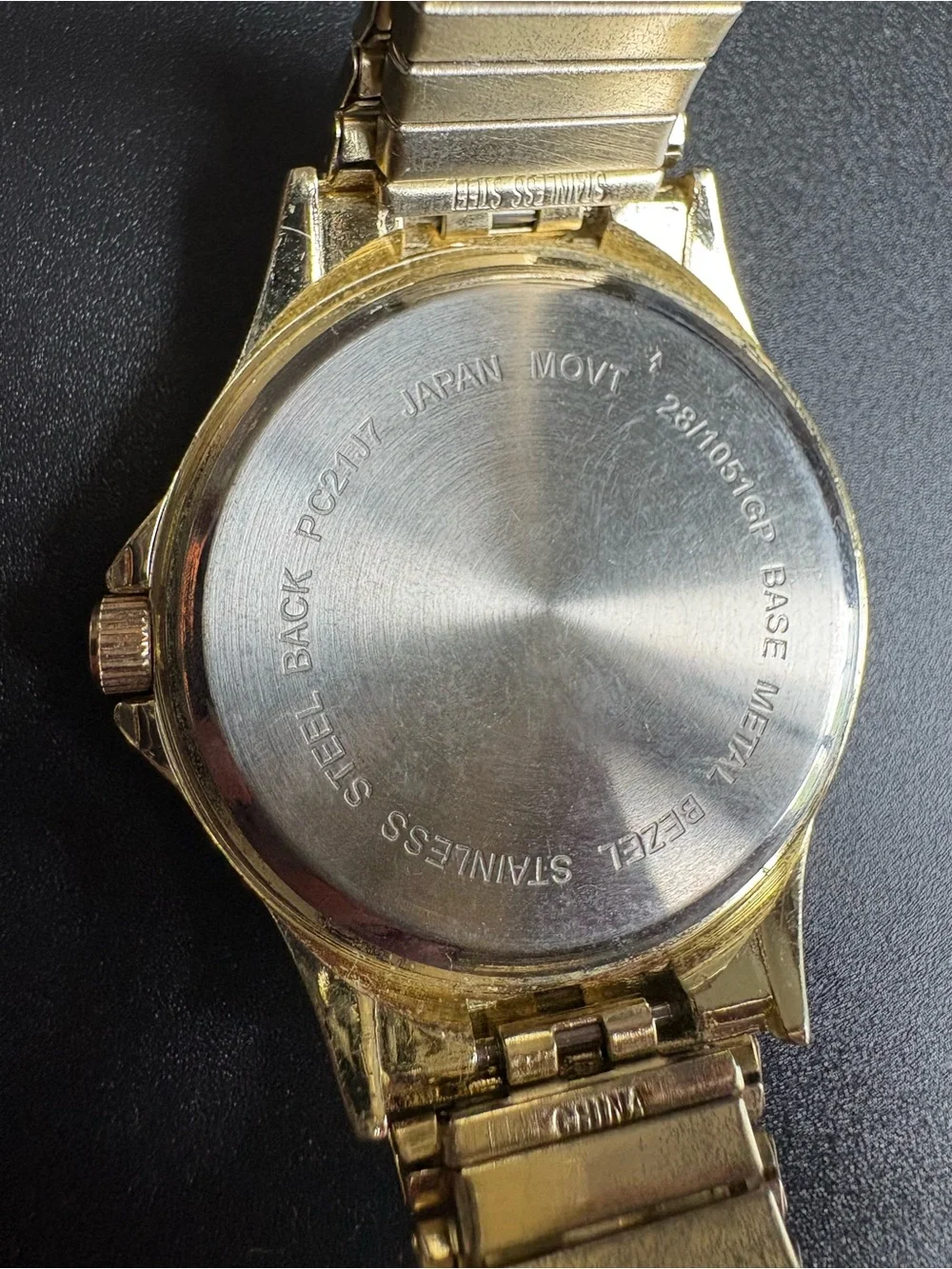 Gold Tone Watch with Black Dial